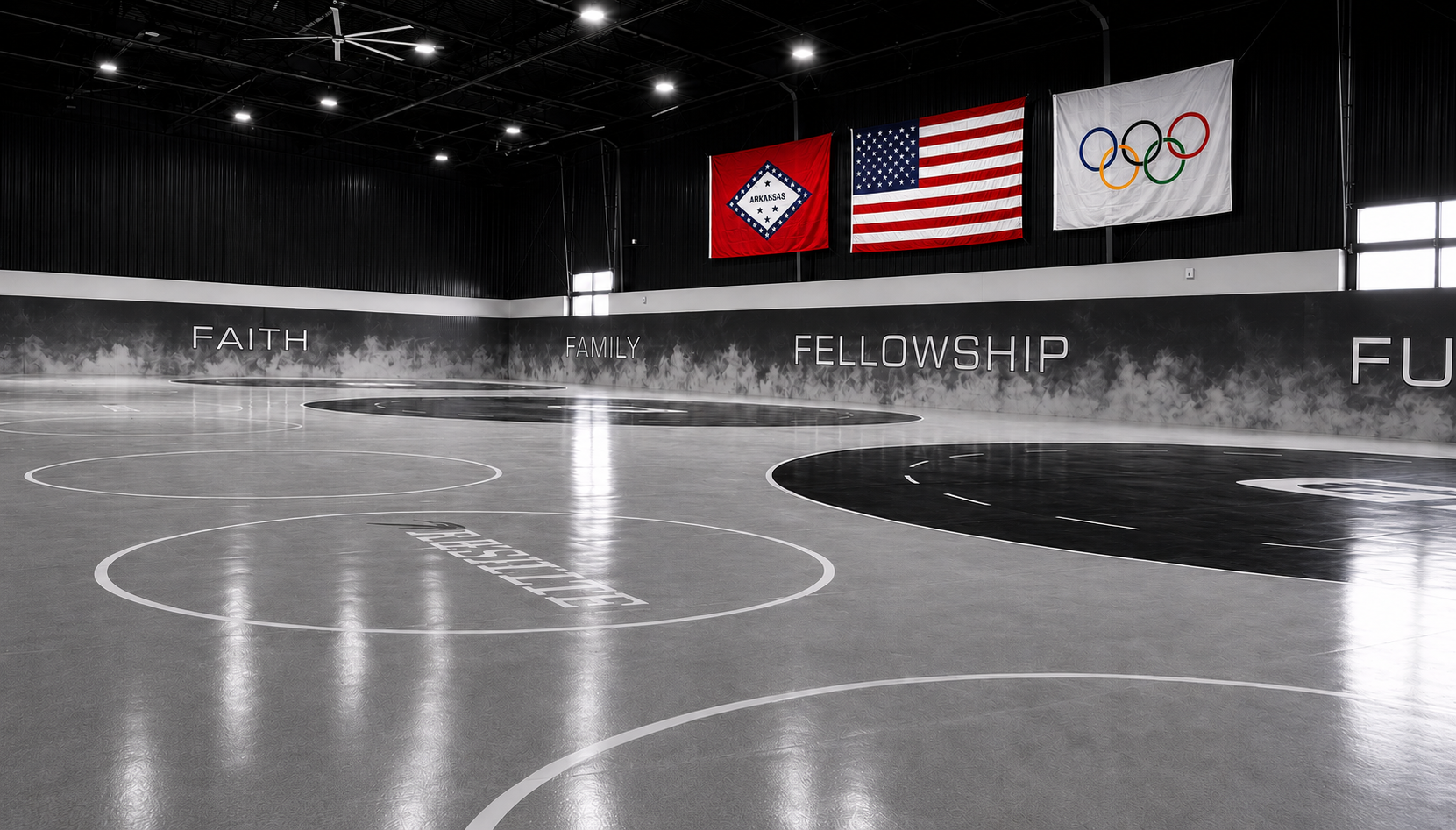 G1 Training Center wrestling facility interior with mats